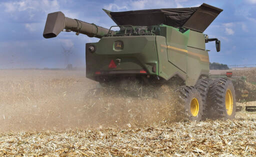 October 6, 2025, Normal, Illinois, USA: A combine harvester completes its turn at the edge of the field, positioning itself to begin the next pass, a continuous process during the intensive autumn harvest season.